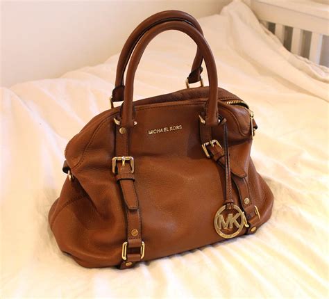 who sells michael kors bags|sell used michael kors handbags.